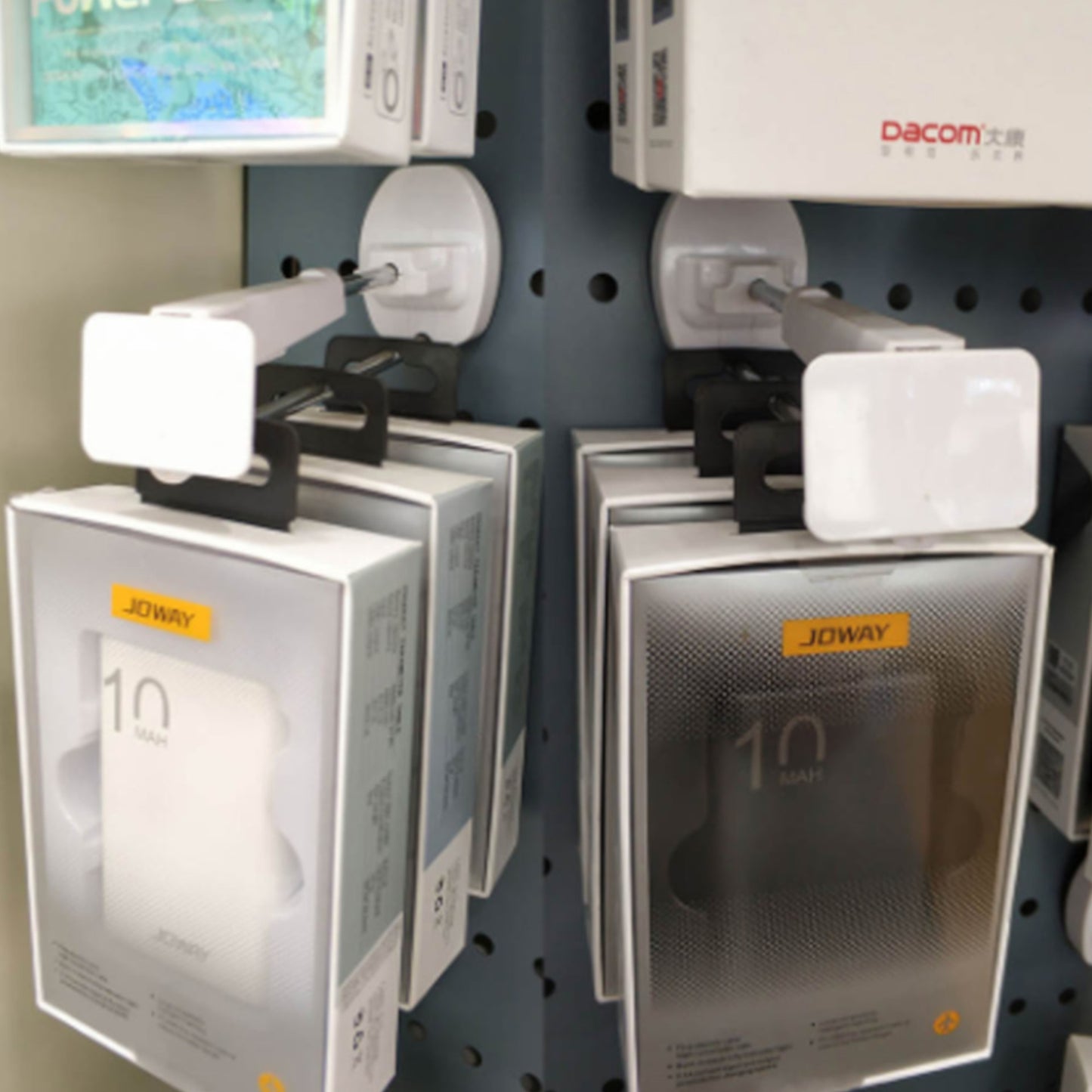 Sujetador de mercadería para placa con surco SF2002